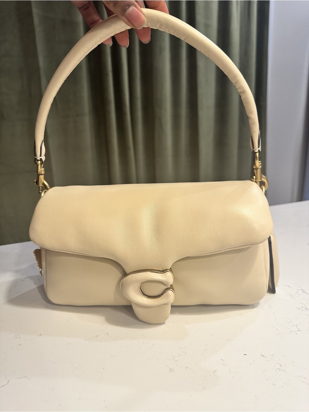 Coach pillow tabby in cream